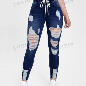 Distress skinny jeans